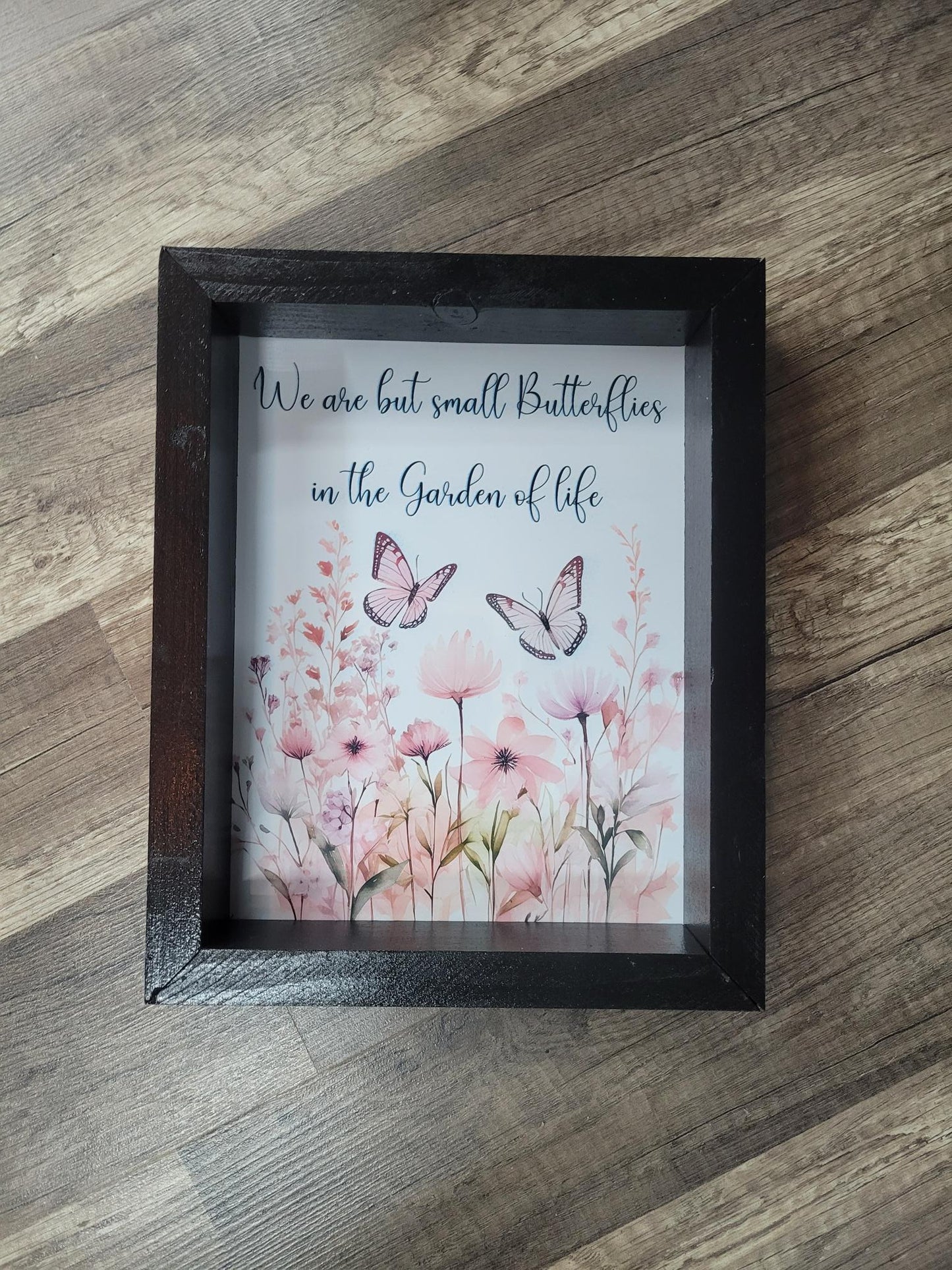 Butterflies in Garden of Life Sign